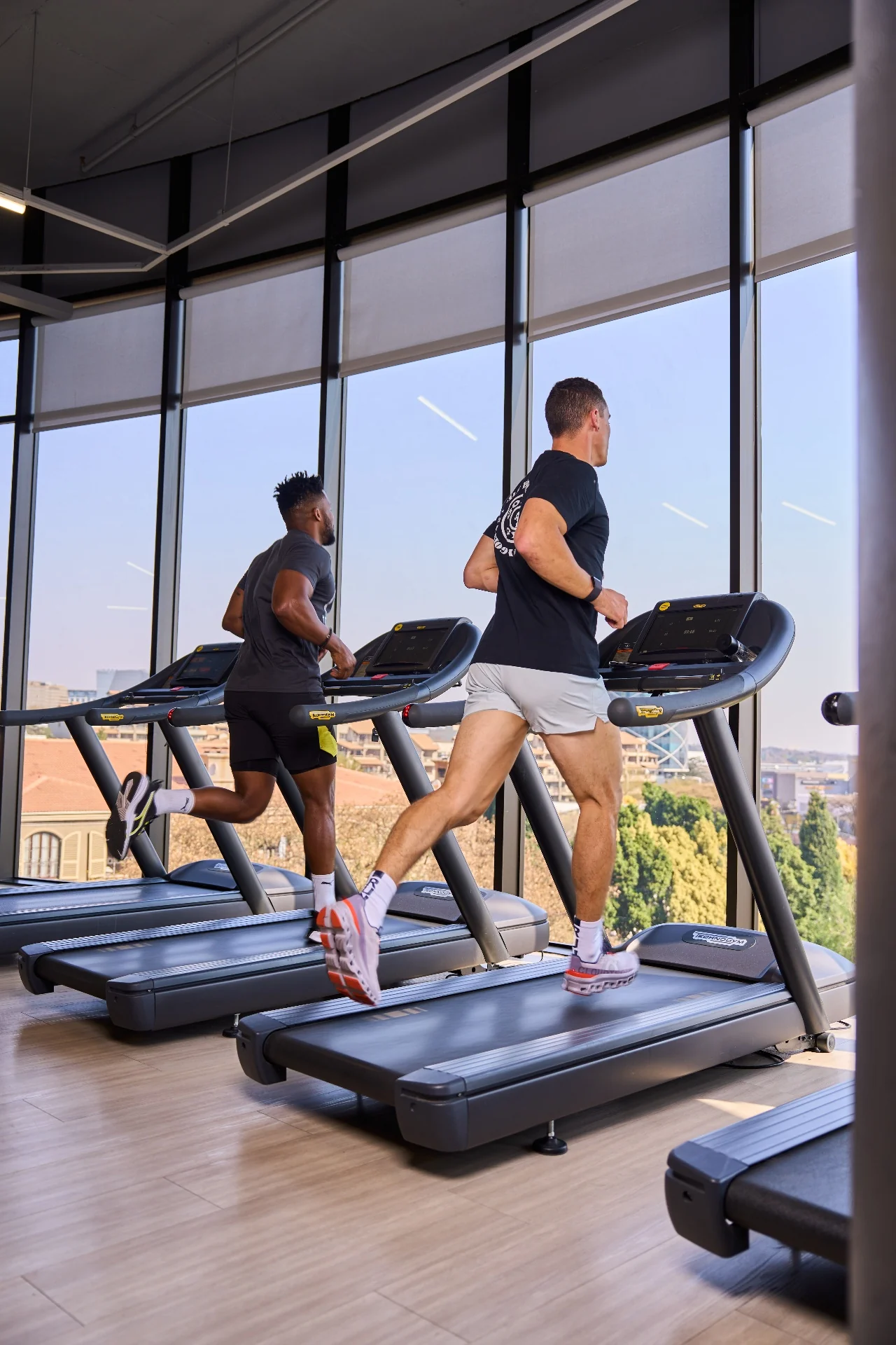 Cardio with a city view at Gold's Gym